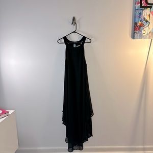 Long black flowing dress.